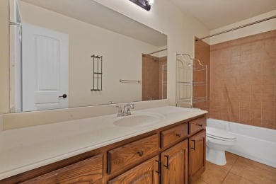 Beautifully refreshed 3-bedroom, 3.5-bath home located near the on WestRidge Golf Course in Texas - for sale on GolfHomes.com, golf home, golf lot