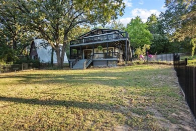 Discover your dream getaway at this idyllic lakehouse nestled in on Tanglewood Resort in Texas - for sale on GolfHomes.com, golf home, golf lot