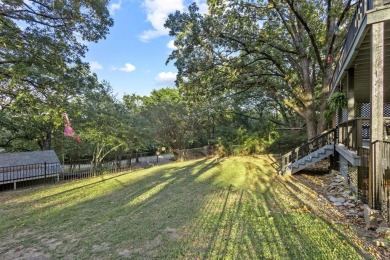 Discover your dream getaway at this idyllic lakehouse nestled in on Tanglewood Resort in Texas - for sale on GolfHomes.com, golf home, golf lot