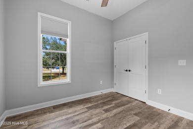 Welcome to a home that truly has it all--modern comfort on The Lakes Country Club in North Carolina - for sale on GolfHomes.com, golf home, golf lot
