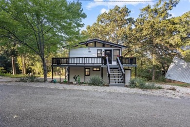Discover your dream getaway at this idyllic lakehouse nestled in on Tanglewood Resort in Texas - for sale on GolfHomes.com, golf home, golf lot