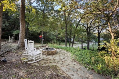 Discover your dream getaway at this idyllic lakehouse nestled in on Tanglewood Resort in Texas - for sale on GolfHomes.com, golf home, golf lot