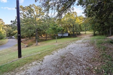 Discover your dream getaway at this idyllic lakehouse nestled in on Tanglewood Resort in Texas - for sale on GolfHomes.com, golf home, golf lot