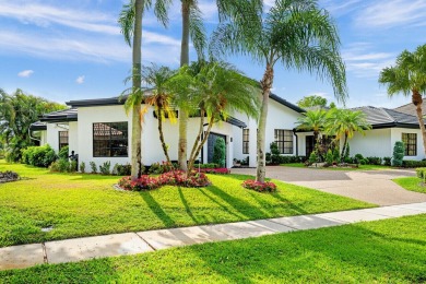 Welcome to this exceptional one-story estate in the highly on Boca West Golf and Country Club in Florida - for sale on GolfHomes.com, golf home, golf lot