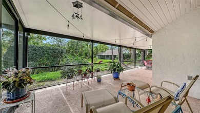 Move-in ready! Updated maintenance-free villa with serene pond on The Meadows Golf and Country Club in Florida - for sale on GolfHomes.com, golf home, golf lot