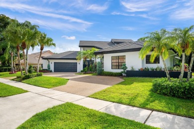 Welcome to this exceptional one-story estate in the highly on Boca West Golf and Country Club in Florida - for sale on GolfHomes.com, golf home, golf lot