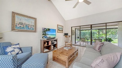 Move-in ready! Updated maintenance-free villa with serene pond on The Meadows Golf and Country Club in Florida - for sale on GolfHomes.com, golf home, golf lot