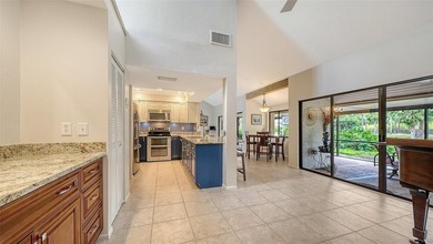 Move-in ready! Updated maintenance-free villa with serene pond on The Meadows Golf and Country Club in Florida - for sale on GolfHomes.com, golf home, golf lot