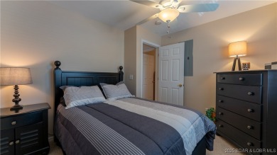 WOW!! BRAND NEW Living Area LVP and furnishings invite you into on Lake Valley Country Club in Missouri - for sale on GolfHomes.com, golf home, golf lot