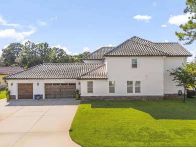 Welcome to this beautifully remodeled and redecorated two-story on Emerald Bay Golf Club in Florida - for sale on GolfHomes.com, golf home, golf lot