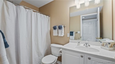 WOW!! BRAND NEW Living Area LVP and furnishings invite you into on Lake Valley Country Club in Missouri - for sale on GolfHomes.com, golf home, golf lot