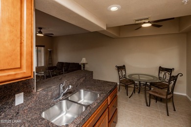 Check out this SUPER CLEAN one-bedroom, one-bath ground-level on London Bridge Golf Course in Arizona - for sale on GolfHomes.com, golf home, golf lot