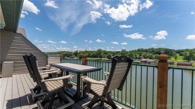 WOW!! BRAND NEW Living Area LVP and furnishings invite you into on Lake Valley Country Club in Missouri - for sale on GolfHomes.com, golf home, golf lot