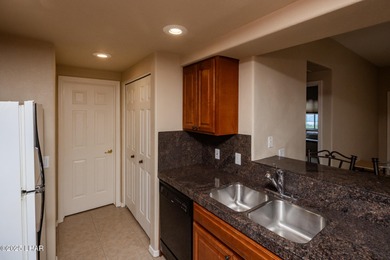 Check out this SUPER CLEAN one-bedroom, one-bath ground-level on London Bridge Golf Course in Arizona - for sale on GolfHomes.com, golf home, golf lot