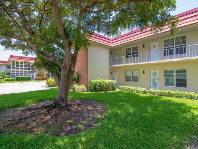 Resort style living here in beautifully remodeled 1st floor home on The American Golf Club in Florida - for sale on GolfHomes.com, golf home, golf lot