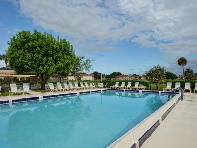 Resort style living here in beautifully remodeled 1st floor home on The American Golf Club in Florida - for sale on GolfHomes.com, golf home, golf lot