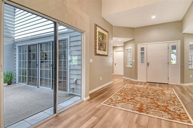 Privately tucked away within the private Winding Oaks community on Longboat Key Golf Club Resort in Florida - for sale on GolfHomes.com, golf home, golf lot