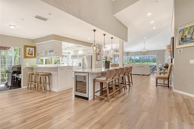 Privately tucked away within the private Winding Oaks community on Longboat Key Golf Club Resort in Florida - for sale on GolfHomes.com, golf home, golf lot