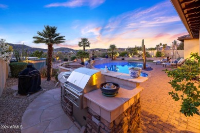 Enjoy views of Golf Club of Estrella's 3rd Fairway from the pool on Estrella Mountain Ranch Golf Course in Arizona - for sale on GolfHomes.com, golf home, golf lot