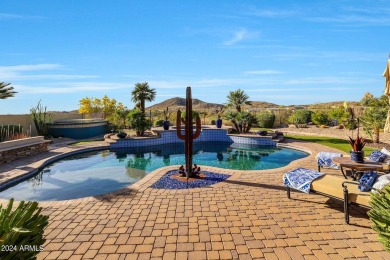 Enjoy views of Golf Club of Estrella's 3rd Fairway from the pool on Estrella Mountain Ranch Golf Course in Arizona - for sale on GolfHomes.com, golf home, golf lot