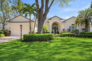 Step into a stunning, light-filled residence where elegance on University Park Country Club in Florida - for sale on GolfHomes.com, golf home, golf lot
