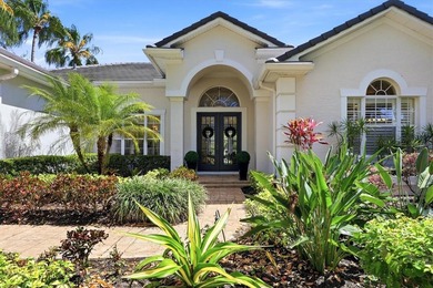 Step into a stunning, light-filled residence where elegance on University Park Country Club in Florida - for sale on GolfHomes.com, golf home, golf lot