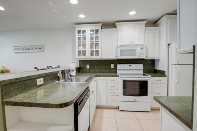 Welcome to this cozy, tastefully decorated 55+ first floor condo on Fountains Golf and Country Club in Florida - for sale on GolfHomes.com, golf home, golf lot
