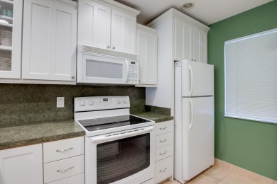 Welcome to this cozy, tastefully decorated 55+ first floor condo on Fountains Golf and Country Club in Florida - for sale on GolfHomes.com, golf home, golf lot