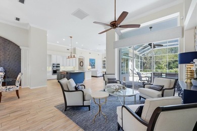 Step into a stunning, light-filled residence where elegance on University Park Country Club in Florida - for sale on GolfHomes.com, golf home, golf lot