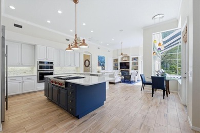 Step into a stunning, light-filled residence where elegance on University Park Country Club in Florida - for sale on GolfHomes.com, golf home, golf lot