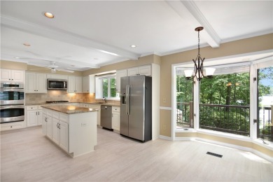 Located on a point lot in Keowee Key, the premiere Lake Keowee on Keowee Key Golf and Country Club in South Carolina - for sale on GolfHomes.com, golf home, golf lot