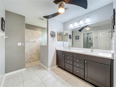 Welcome to this stunning 3-bedroom, 2-bath residence nestled in on Arlington Ridge Golf Club in Florida - for sale on GolfHomes.com, golf home, golf lot