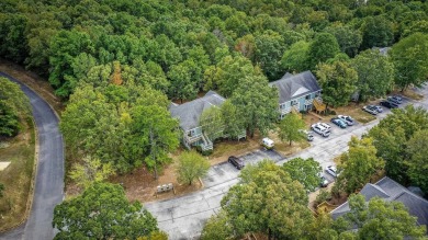 This stunning, updated studio is tucked away among the trees on on Mountain Ranch Golf Club in Arkansas - for sale on GolfHomes.com, golf home, golf lot