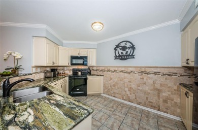 Under contract-accepting backup offers. Great value! Step into on Isla Del Sol Yacht and Country Club in Florida - for sale on GolfHomes.com, golf home, golf lot