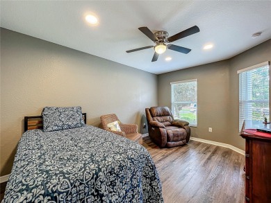 Welcome to this stunning 3-bedroom, 2-bath residence nestled in on Arlington Ridge Golf Club in Florida - for sale on GolfHomes.com, golf home, golf lot