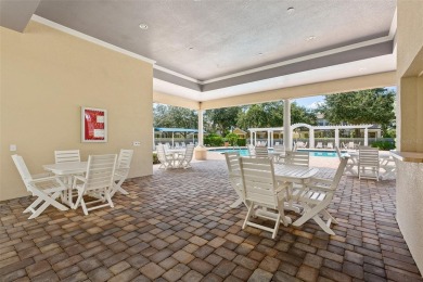 Discover maintenance-free living in this charming 2-bedroom on Harmony Golf Preserve in Florida - for sale on GolfHomes.com, golf home, golf lot
