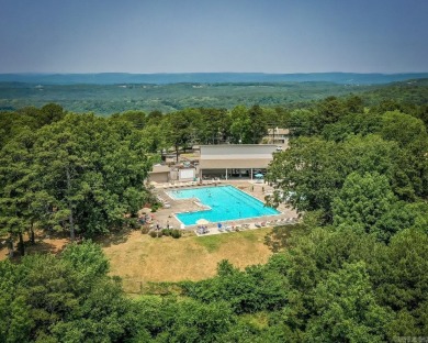 This stunning, updated studio is tucked away among the trees on on Mountain Ranch Golf Club in Arkansas - for sale on GolfHomes.com, golf home, golf lot