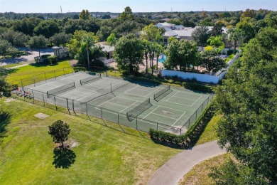 Discover maintenance-free living in this charming 2-bedroom on Harmony Golf Preserve in Florida - for sale on GolfHomes.com, golf home, golf lot