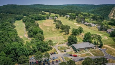 This stunning, updated studio is tucked away among the trees on on Mountain Ranch Golf Club in Arkansas - for sale on GolfHomes.com, golf home, golf lot