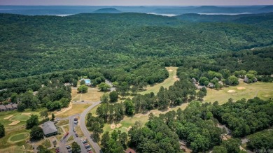 This stunning, updated studio is tucked away among the trees on on Mountain Ranch Golf Club in Arkansas - for sale on GolfHomes.com, golf home, golf lot