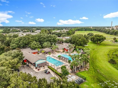 Welcome to this stunning 3-bedroom, 2-bath residence nestled in on Arlington Ridge Golf Club in Florida - for sale on GolfHomes.com, golf home, golf lot