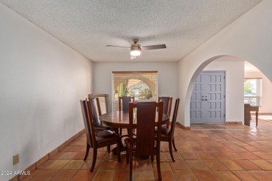 5 BR 2.5 BA single level home in prestigious Laguna Shores of on Dobson Ranch Municipal Golf Course in Arizona - for sale on GolfHomes.com, golf home, golf lot