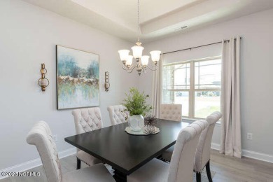 Welcome to 5712 Sloop Ct,  your new home sweet home! Let's take on Harbour Point Golf Club in North Carolina - for sale on GolfHomes.com, golf home, golf lot