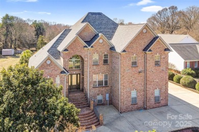 Experience luxury and privacy on over an acre in Mooresville's on Mallard Head Country Club in North Carolina - for sale on GolfHomes.com, golf home, golf lot