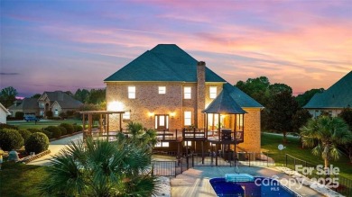 Experience luxury and privacy on over an acre in Mooresville's on Mallard Head Country Club in North Carolina - for sale on GolfHomes.com, golf home, golf lot