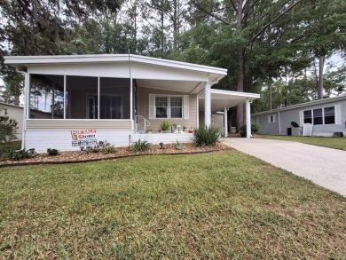 2BR/2BA Home with Modern Touches | Rolling Greens Village on Rolling Greens Executive Golf Community in Florida - for sale on GolfHomes.com, golf home, golf lot