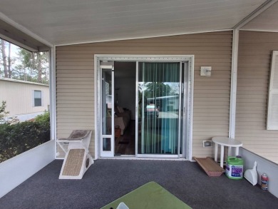 2BR/2BA Home with Modern Touches | Rolling Greens Village on Rolling Greens Executive Golf Community in Florida - for sale on GolfHomes.com, golf home, golf lot