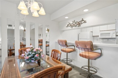 Welcome to your cozy, turnkey condo boasting breathtaking lake & on Vista Plantation Golf Club in Florida - for sale on GolfHomes.com, golf home, golf lot