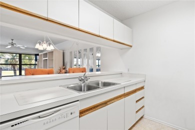 Welcome to your cozy, turnkey condo boasting breathtaking lake & on Vista Plantation Golf Club in Florida - for sale on GolfHomes.com, golf home, golf lot