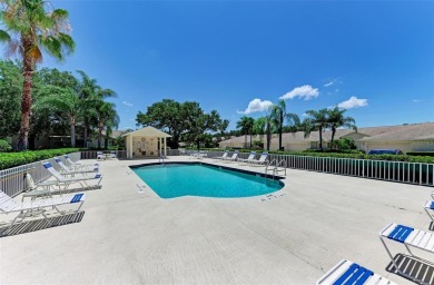 Stunning 1 Story Villa, end unit, on a quiet cul-de-sac street on Tara Golf and Country Club in Florida - for sale on GolfHomes.com, golf home, golf lot